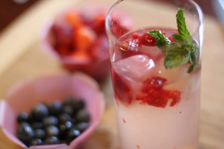 Lemonade with raspberries, Raspberry Ice Cubes, and a mint garnish! yummm