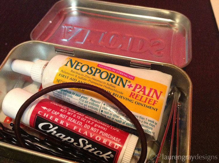 Nicely packed altoid can first aid kit :)